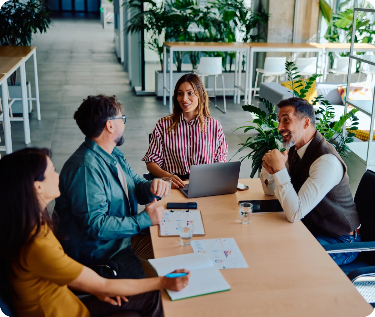 Group of coworkers engaged in discussion